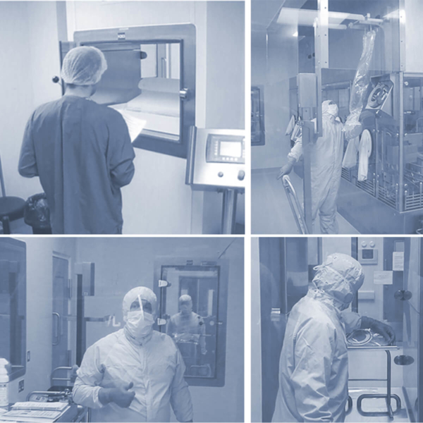 Personer hanterar en dubbelpåse med hjälp av rostfria lyftvagnar